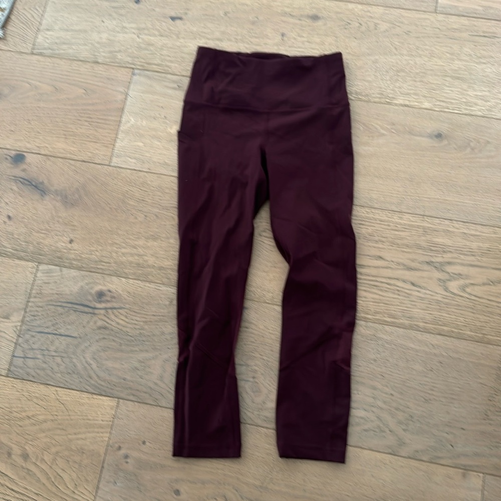 Lululemon size 2 mid rise leggings with pockets maroon